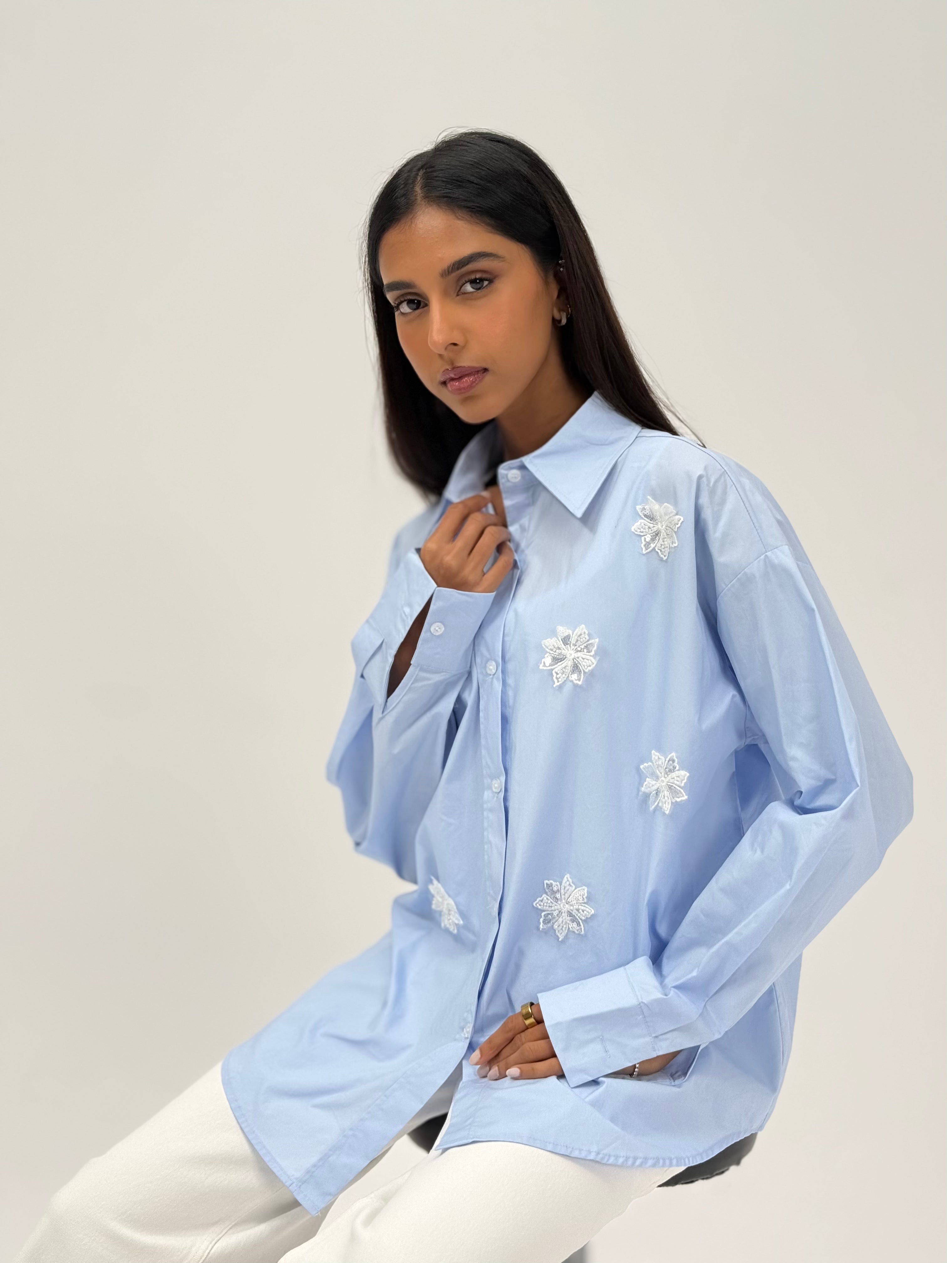 Shirt with beaded flower